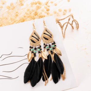 Feather earrings and pearl earrings